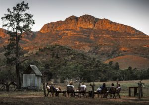Sundowner drinks as the sun sinks behind Wilpena Pound - Paul Bester